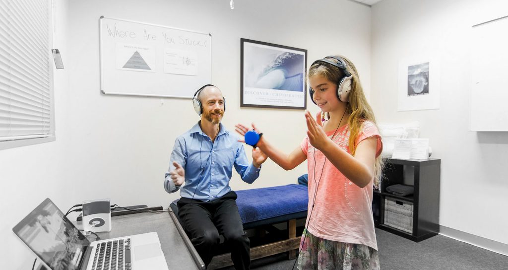 Adam with girl doing exercise